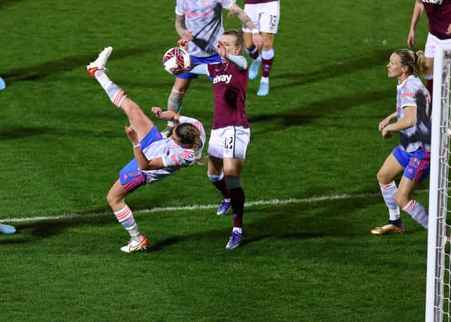 <p>Ella Toone of Manchester United scores their team’s first goal during the Barclays FA Women’s Super League match between West Ham United Women and Manchester United Women Credit: Getty</p>
