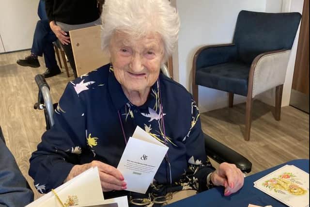 Frances enjoying her 100th birthday at Belong Morris Feinmann in Didsbury