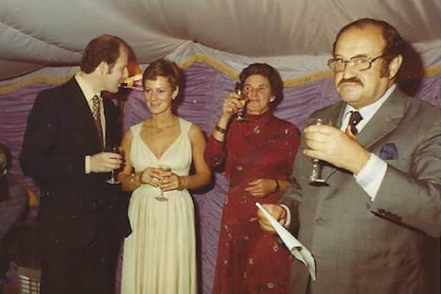 Frances Waldek (in the red dress), in 1976 at her son and soon-to-be daughter-in-law’s engagement party (the couple are on the left). Her late husband is also pictured (right)