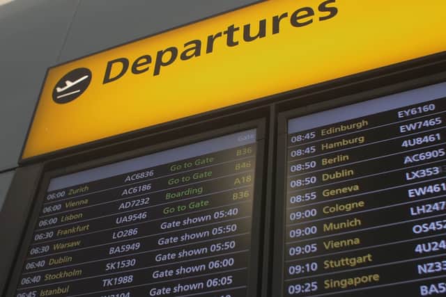 Departures board at Manchester airport 