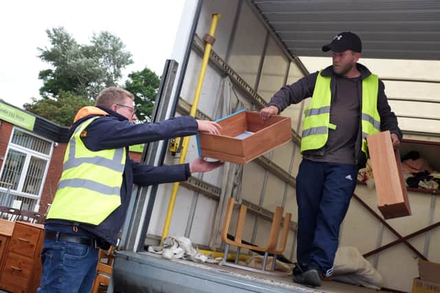 Items being unloaded at Emmaus Salford