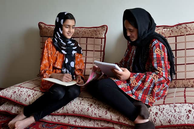 Girls having to study at home in Kabul. Photo:Ahmad Sahel Arman/AFP via Getty Images