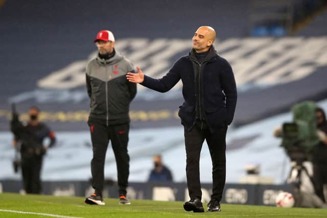Klopp and Guardiola have both assembled title-winning squads. Credit: Getty.