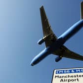 Manchester Airport has faced challenges with queues and delays as it tries to recruit more staff Credit: Getty