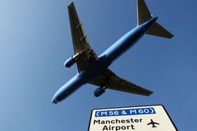 Manchester Airport has faced challenges with queues and delays as it tries to recruit more staff Credit: Getty