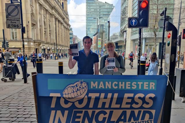 Toothless in Manchester campaigners at the city centre stall