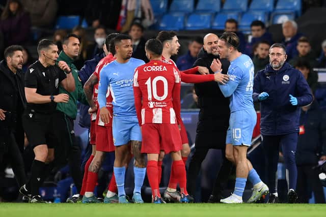 Guardiola stepped in to pull Grealish away from a second-half confrontation with Correa. Credit: Getty.