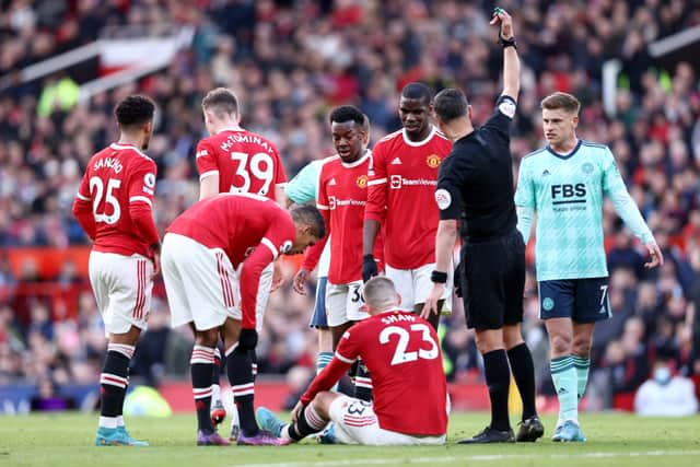 Shaw was replaced at half-time in the 1-1 draw with Leicester. Credit: Getty.