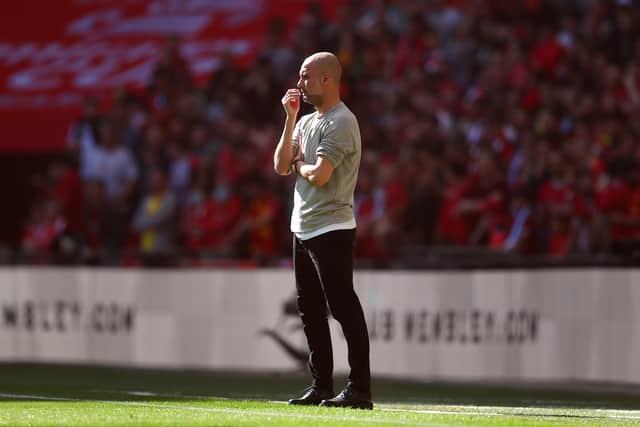 Pep Guardiola apologised in Sunday’s post-match press conference for the actions of a few Manchester City fans. Credit: Getty.