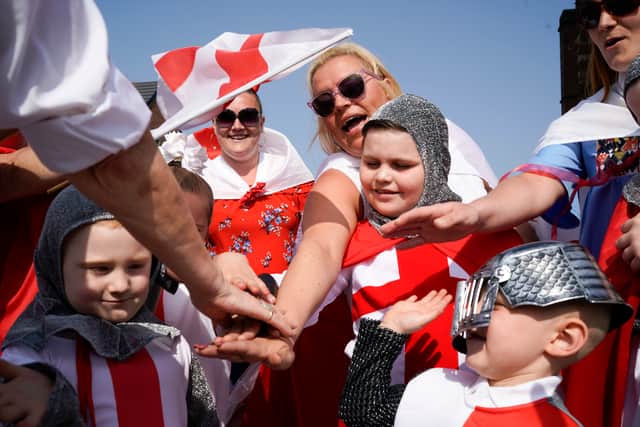 People dressed as St George take part in the Manchester St George’s Day parade in 2019 Credit: Getty