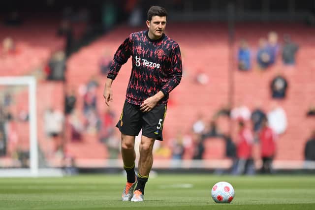 Harry Maguire started on the bench at the Emirates. Credit: Getty.