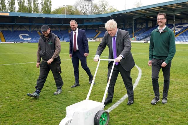 Prime minister Boris Johnson on a visit to Bury FC’s Gigg Lane ground. Photo: Danny Lawson/AFP via Getty Images