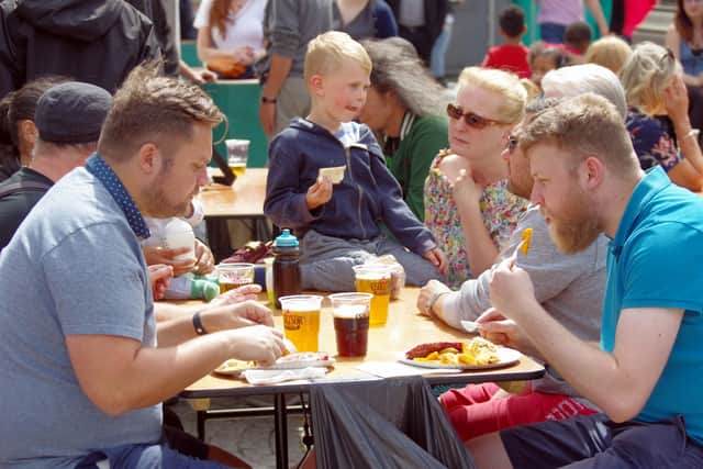 Festival-goers enjoying the food and drink at a previous Góbéfest