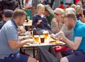 Festival-goers enjoying the food and drink at a previous Góbéfest