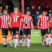 Altrincham celebrate a goal at the J.Davidson Stadium against Dagenham & Redbridge in February. Credit: Jonathan Moore. 