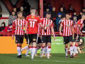 Altrincham celebrate a goal at the J.Davidson Stadium against Dagenham & Redbridge in February. Credit: Jonathan Moore. 