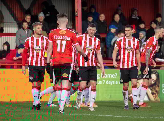 Altrincham celebrate a goal at the J.Davidson Stadium against Dagenham & Redbridge in February. Credit: Jonathan Moore. 