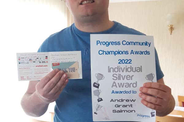 Andrew Salmon with his award
