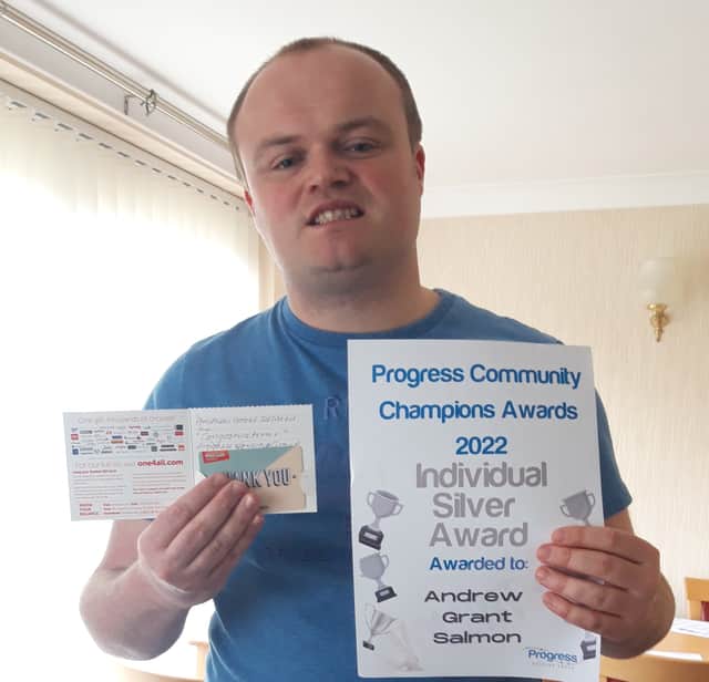 <p>Andrew Salmon with his award</p>