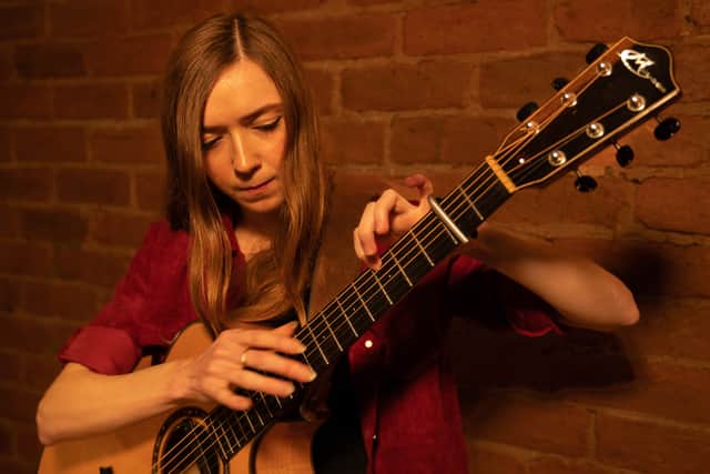 Percussive fingerstyle guitarist Becky Langan