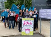 Members of the National Education Union protesting outside Ofsted’s offices in Manchester