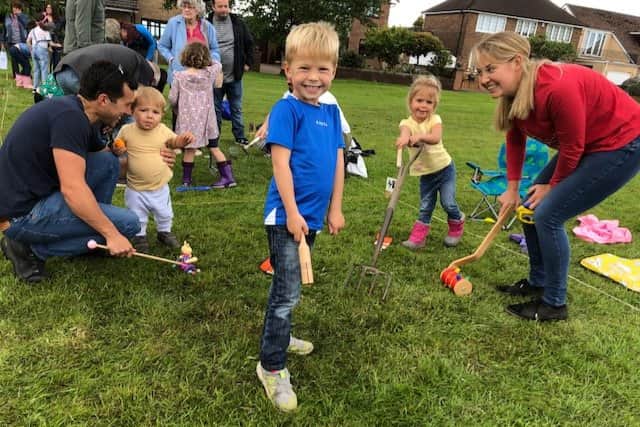 A family taking part in the Aspull Worm Charming Championships