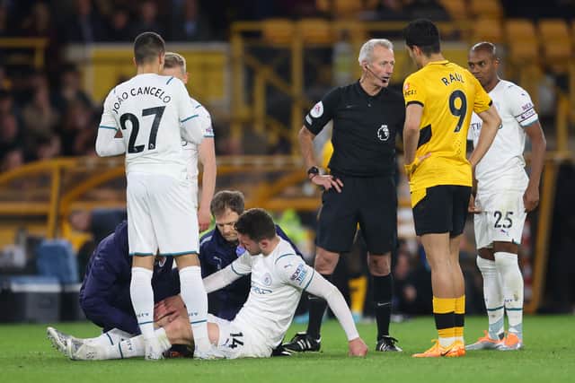 Laporte picked up his knee injury in the midweek win over Wolves. Credit: Getty.