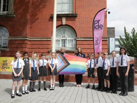 The opening flag-raising ceremony to mark the start of Pride in Trafford. Photo: Jason Lock