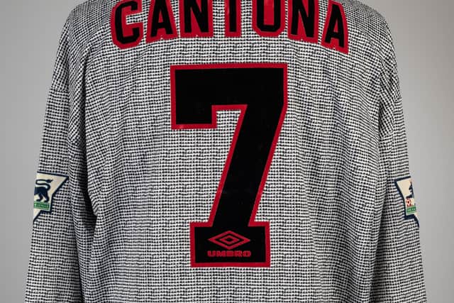Eric Cantona’s grey Manchester United shirt Credit: Graham Budd Auctions / SWNS