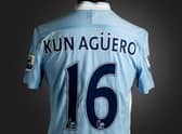 The historic blue Manchester City No.16 jersey was worn by Sergio Agüero Credit: Graham Budd Auctions / SWNS