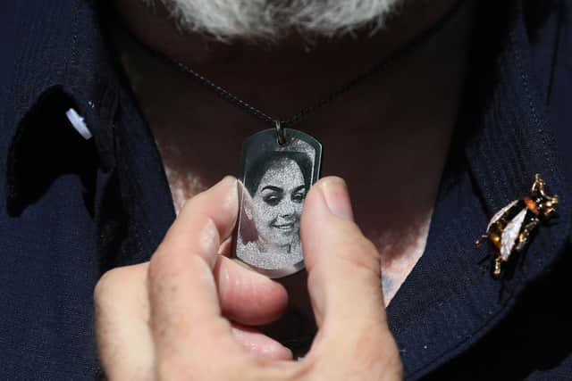 A pendant with a picture of Olivia Campbell-Hardy worn by her grandfather Steve Goodman to the sentencing of the bomber’s brother Hashem Abedi. Photo: Lindsey Parnaby/AFP via Getty Images
