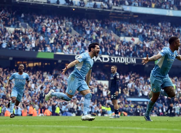 <p>Ilkay Gundogan’s two goals handed Manchester City the title. Credit: Getty.</p>