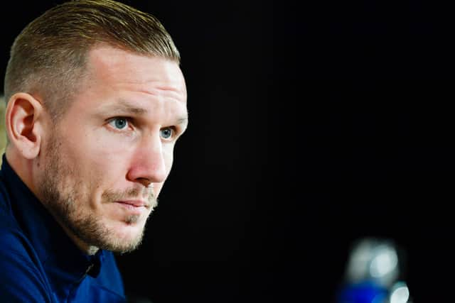 Olsen was struck as he made his way off the pitch. Credit: Getty.