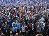 Some Manchester City fans invaded the pitch following their club’s win Credit: Getty