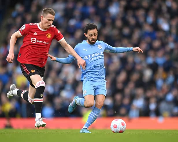 Where Manchester City and Manchester United are predicted to finish in the 22-23 Premier League table. Credit: Getty.