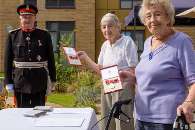Sonja and Gisela receiving their British Empire Medals