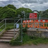 The Jackson’s Boat bridge which connects Chorlton to Sale was fenced off Credit: Sam Tate