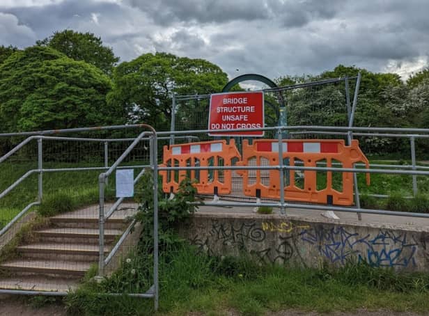 <p>The Jackson’s Boat bridge which connects Chorlton to Sale was fenced off Credit: Sam Tate</p>
