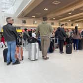 Passengers queue for check in at Manchester Airport’s Terminal 2 in April Credit: Getty