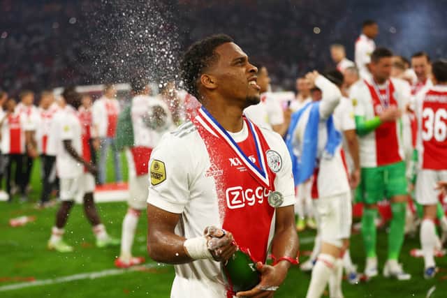 Jurrien Timber celebrating Ajax’s Eredivisie title win.