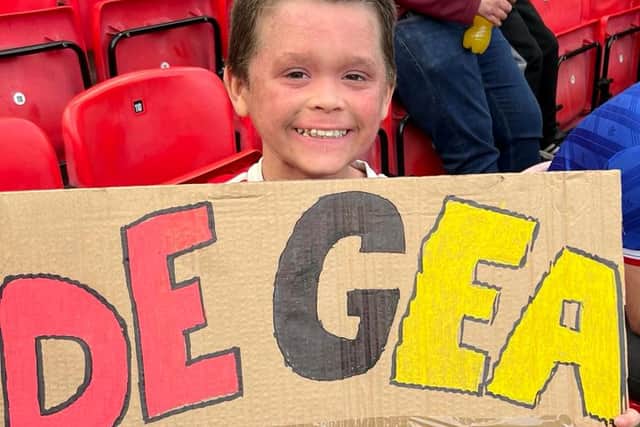 Morgan Bishop and his De Gea sign Credit: Paul Bishop / SWNS