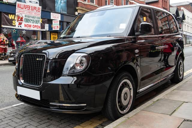 The first electric taxi  in Wigan Credit: Steven McClymont via LDRS