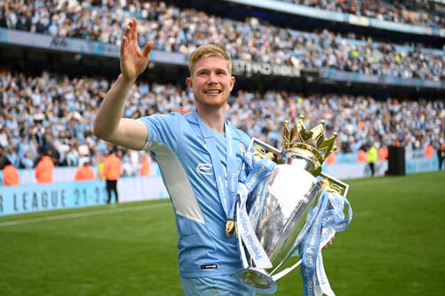 Kevin De Bruyne with the Premier League trophy