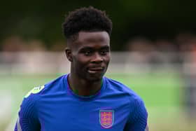 Bukayo Saka has been linked with a move from Arsenal to Manchester City. Credit: Getty.