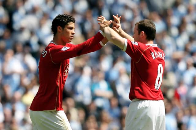 Cristiano Ronaldo and Wayne Rooney playing for Manchester United in 2007. Credit: Getty.