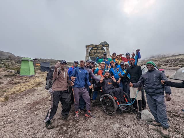Martin Hibbert and team during the climb Credit: Martin's Mountain / SWNS