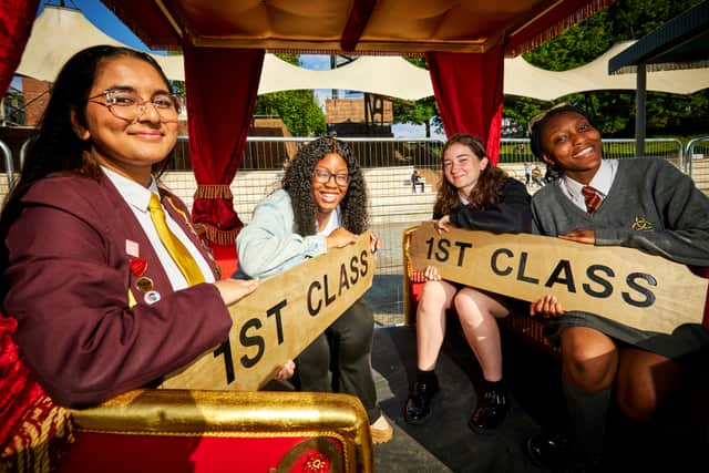 Daanya Isa, 16, from the Youth Parliament and her friends check out the Manchester Day parade preview