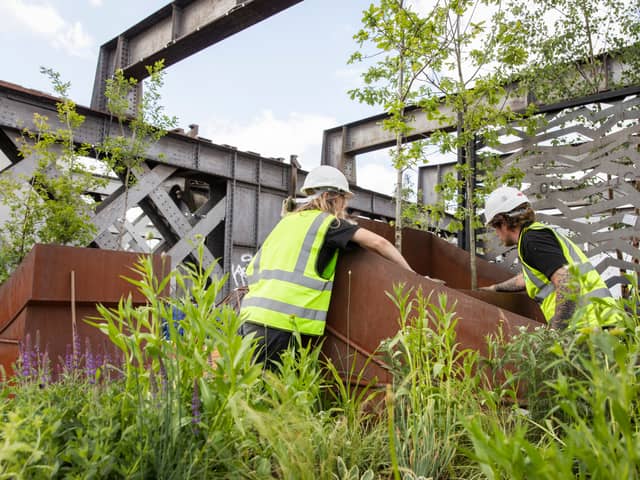 Planting work is under way at Castlefield Viaduct to transform it into a green urban sky park. Photo: Annapurna Mellor/National Trust Images