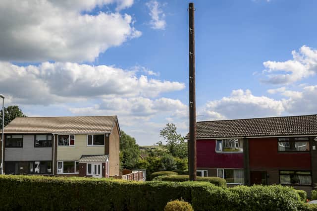 A new pole erected on Link Road in Springhead has angered local residents Credit: SWNS