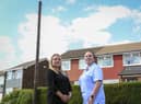 Neighbours Sophie Johnson (left) and Julia Withall (right)by the new pole Credit: SWNS